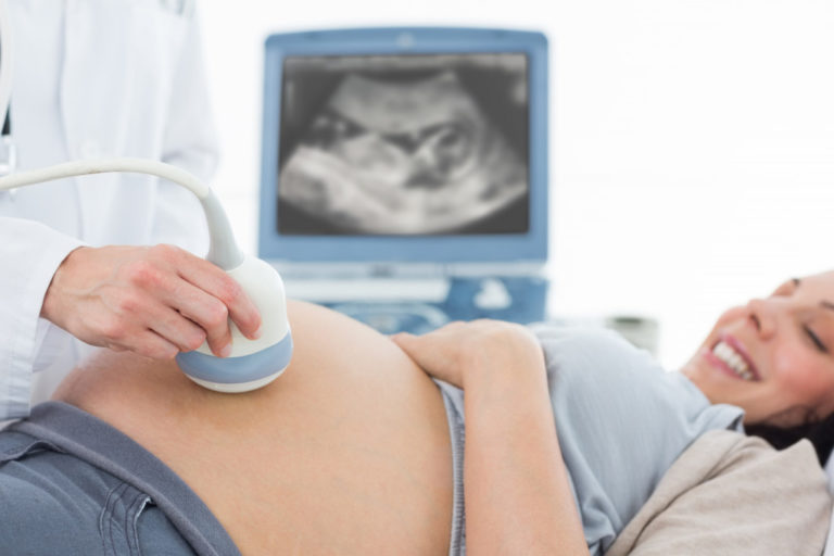 pregnant woman doing ultrasound