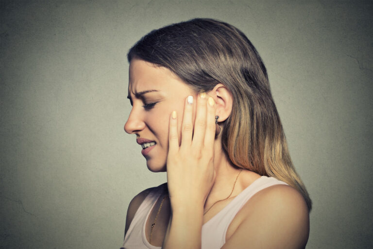 Ear pain in woman